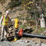 Director of Water Operations David Pedersen surveys the water bypass work.