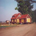 This red farmhouse was moved to the Rattlesnake Reservoir in 1995 to become a caretaker's house.