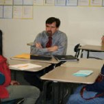 IRWD Engineer Mike Hoolihan assists a student with science project questions.