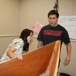 Team members make sure the boat is shipshape.