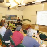 IRWD Sr. Water Use Efficiency Specialist Nick Mrvos instructs customers how to read their water bills.