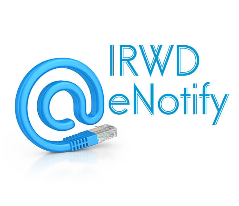 Blue at-sign formed by a curling Ethernet cable beside the IRWD eNotify logo