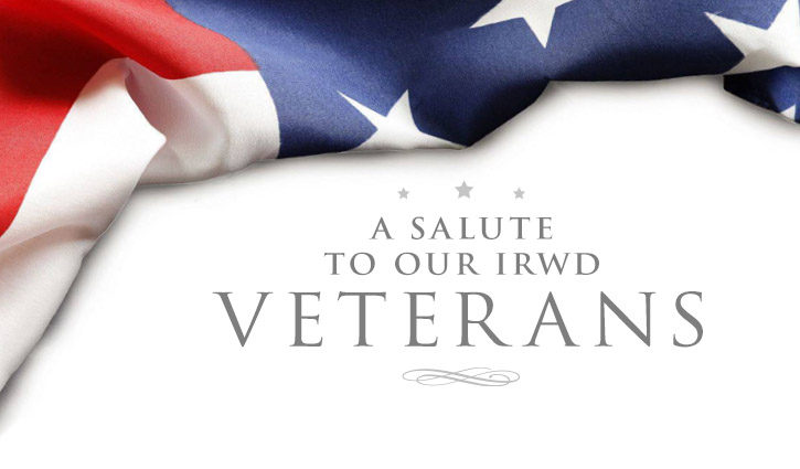 Draped American flag above the phrase 'A Salute to Our IRWD Veterans' on a white background.