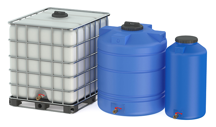 Industrial storage containers: an IBC tote in a metal cage with two blue plastic containers.