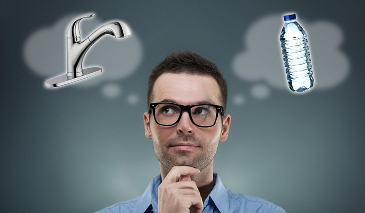 Man wearing glasses thoughtfully contemplates water sources, with a faucet and bottled water in thought.