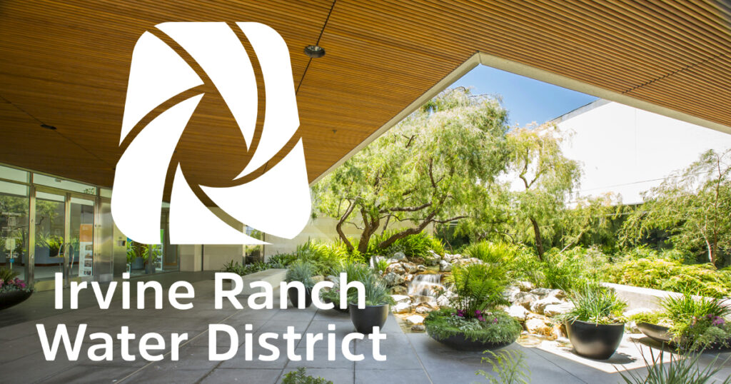 Irvine Ranch Water District logo over a landscaped courtyard with plants and a small waterfall.